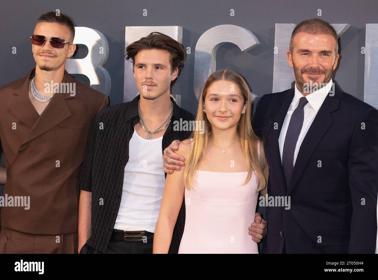 London, UK. 03 October, 2023. (LR) Romeo Beckham, Cruz Beckham, Harper