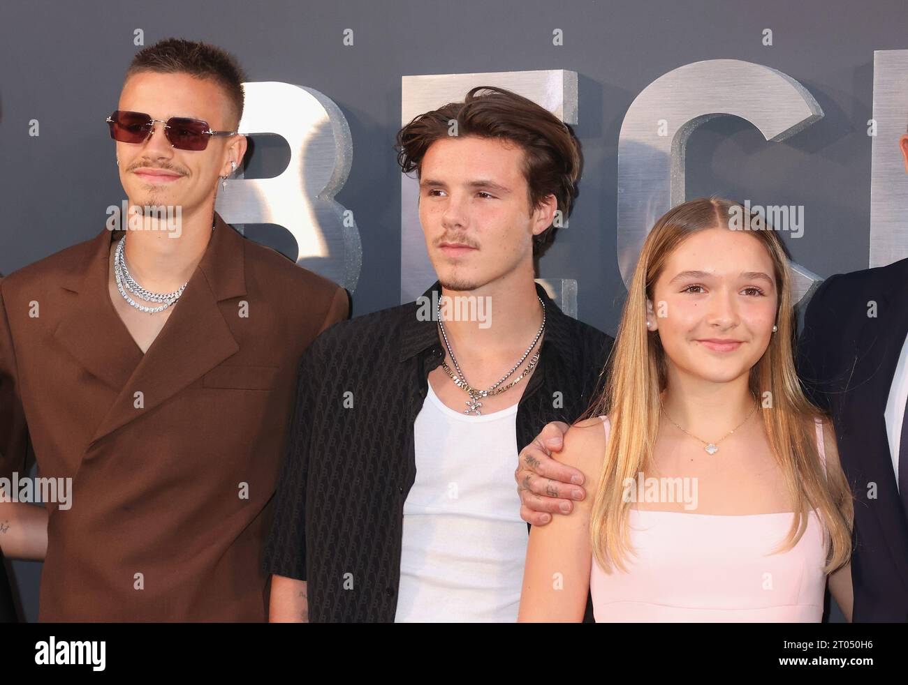 London, UK. 03 October, 2023. (LR) Romeo Beckham, Cruz Beckham and