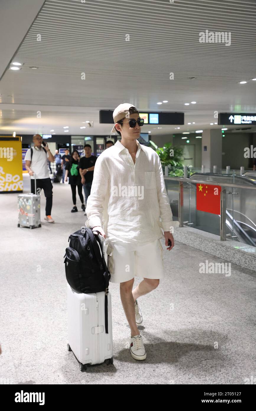 Chinese actor, singer and host Hans Zhang appears at the airport in Shanghai, China. 2nd Oct