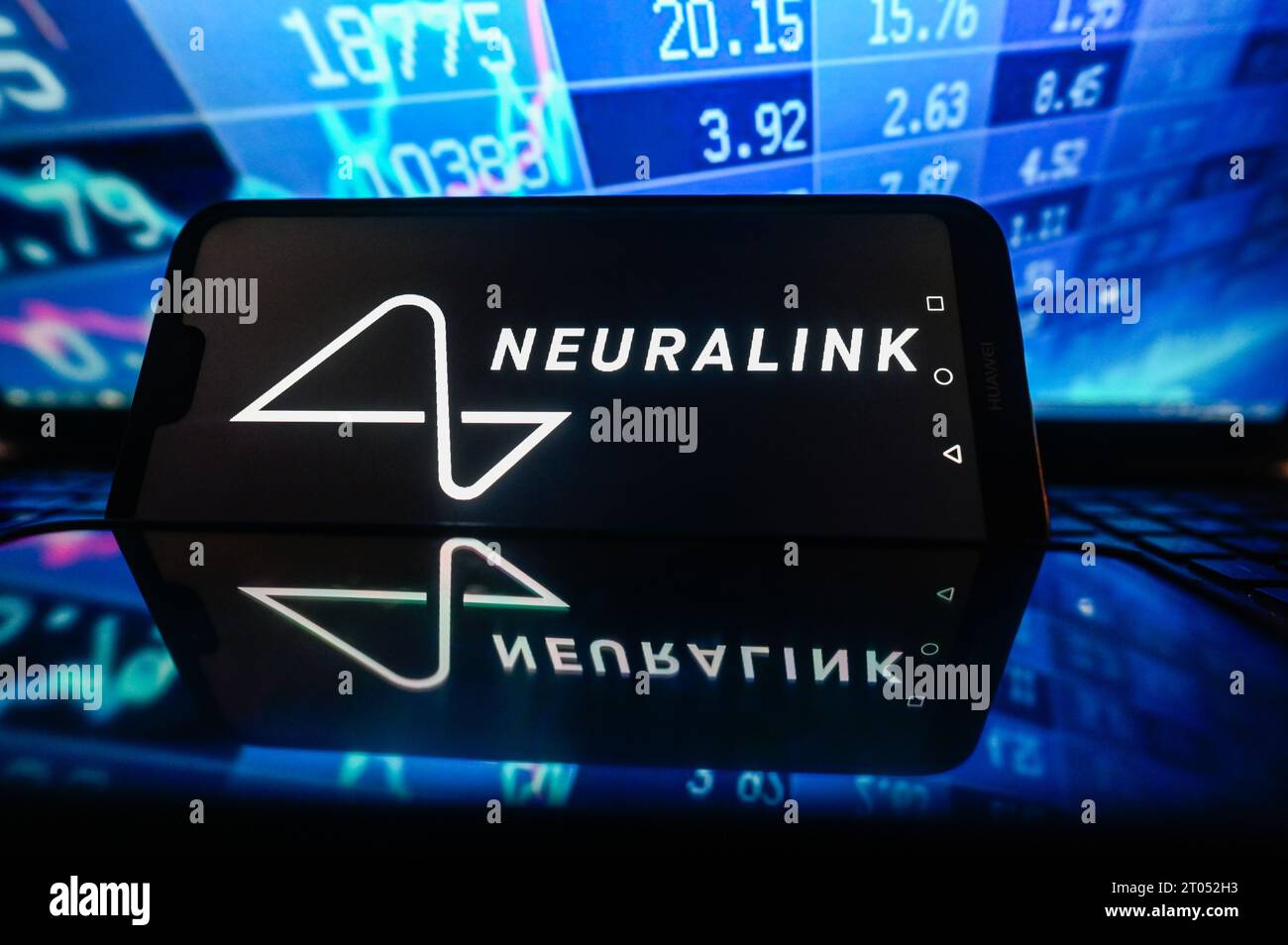 In this photo illustration, a Neuralink logo seen displayed on a