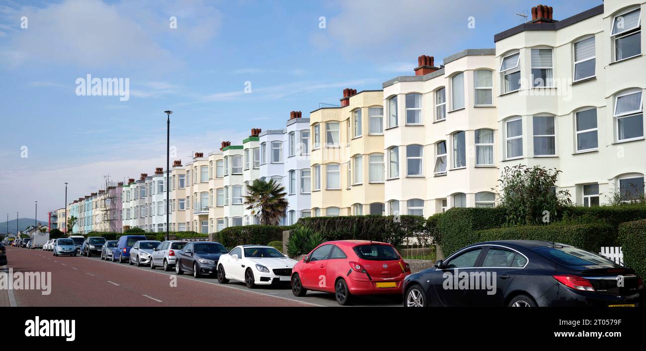 Terrace of colourful painted Houses on the front at Pwllheli Llyn