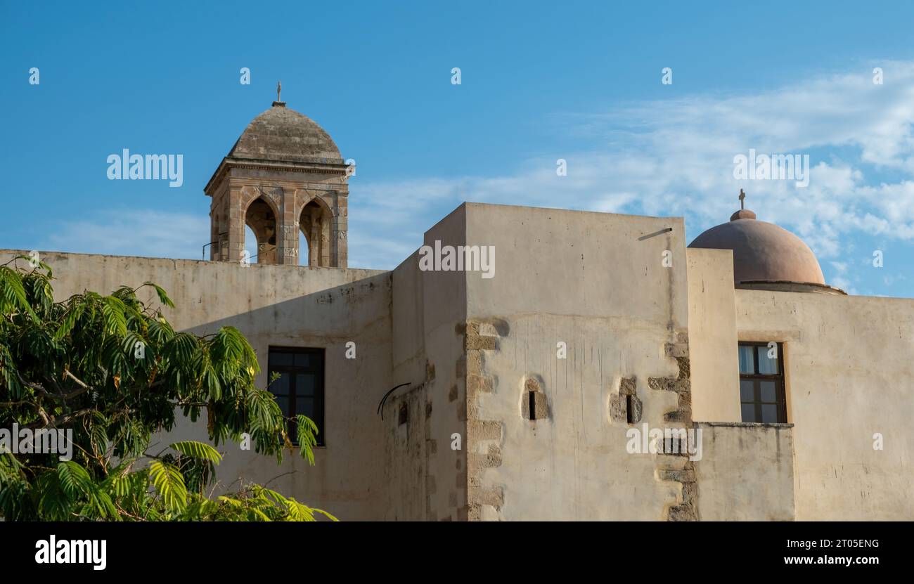 Gonia Monastery or Monastery of Panagia Hodegetria at Kolymvari village, Chania Crete island religious destination Greece. Blue sky background. Stock Photo