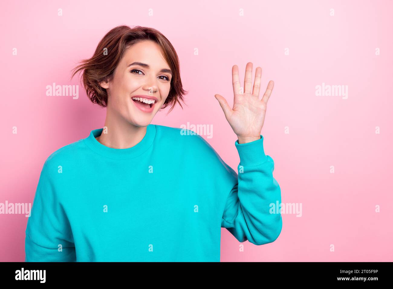 Portrait of positive gorgeous person toothy smile arm palm waving hi ...