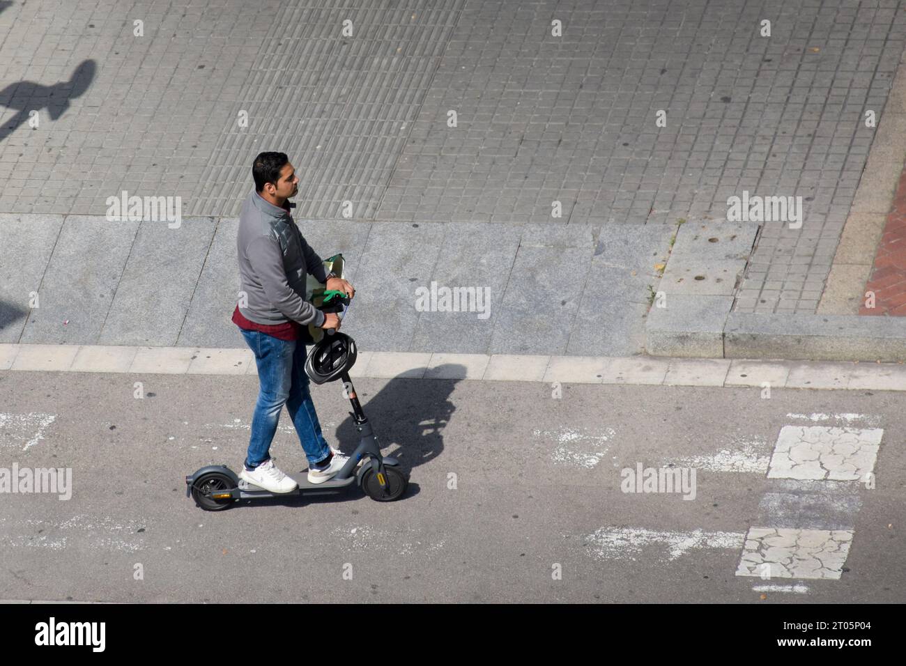 Happy man on scooter hi-res stock photography and images - Alamy