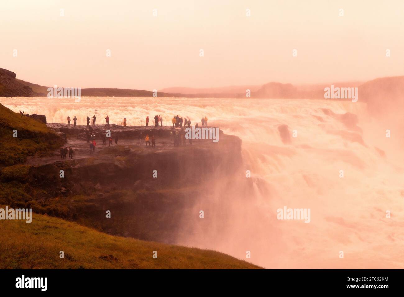Iceland tourism; Tourists at Gullfoss Waterfall Iceland, a large, famous waterfall on the Golden Circle tour, Reykjavik, Iceland Europe Stock Photo