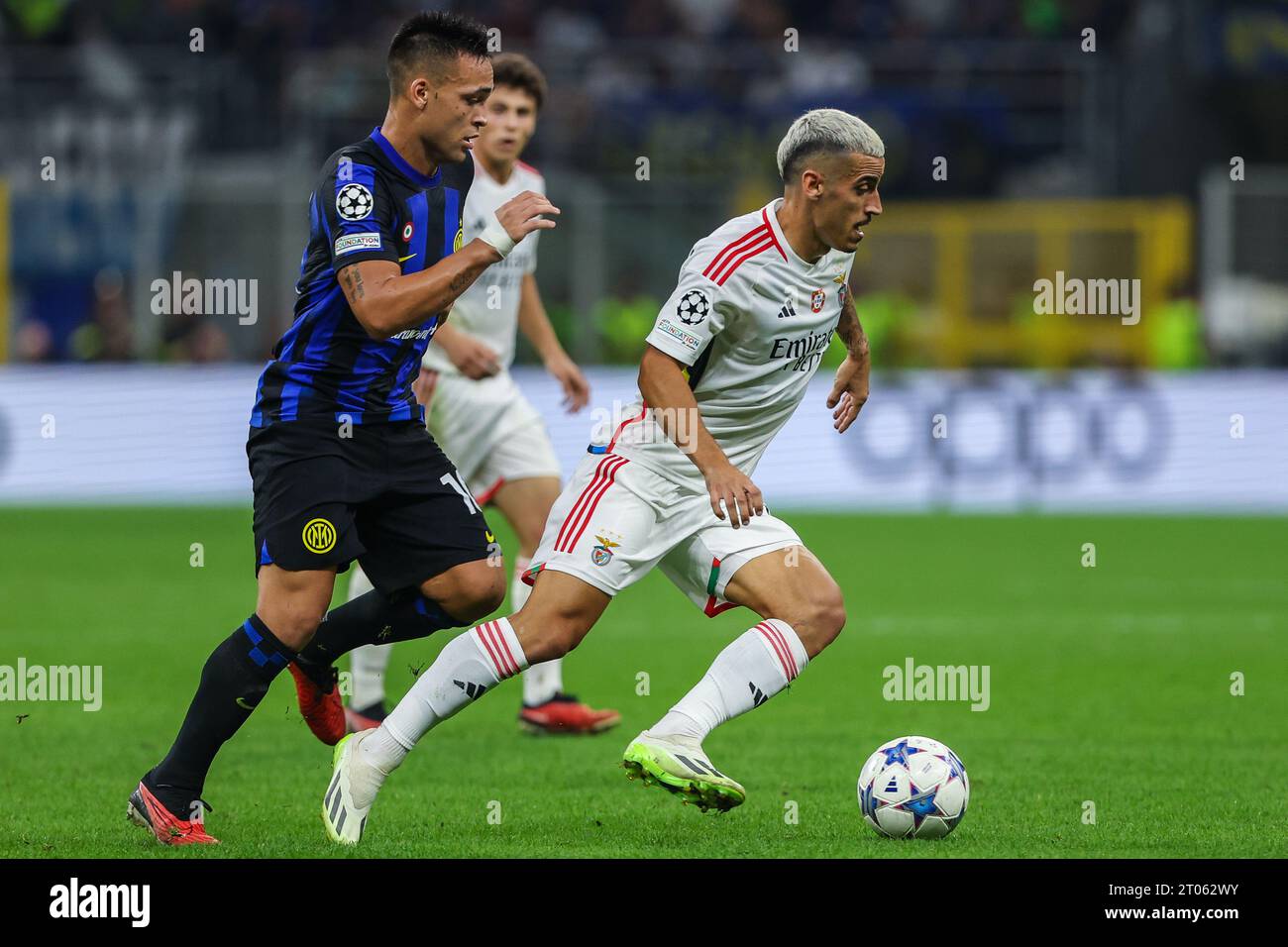 Milan, Italy. 03rd Oct, 2023. Francisco Leonel Lima Silva Machado known as Chiquinho of SL Benfica (R) seen in action with Lautaro Martinez of FC Internazionale (L) during the UEFA Champions League 2023/24 Group Stage - Group D football match between FC Internazionale and SL Benfica at Giuseppe Meazza Stadium. Final score; FC Internazionale 1: 0 SL Benfica. Credit: SOPA Images Limited/Alamy Live News Stock Photo