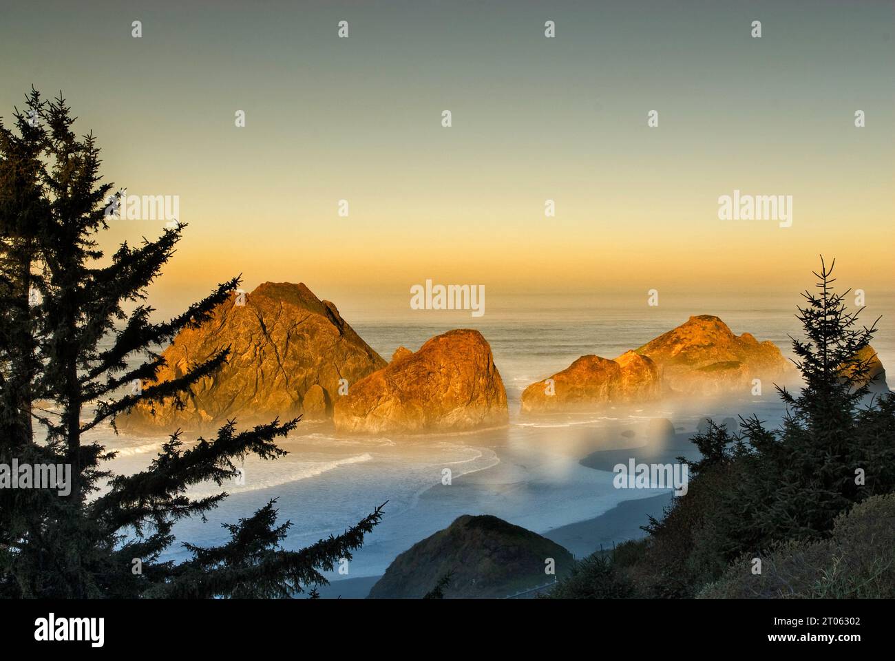 Rocks on Meyers Creek Beach in Pistol River State Park shrouded in fog