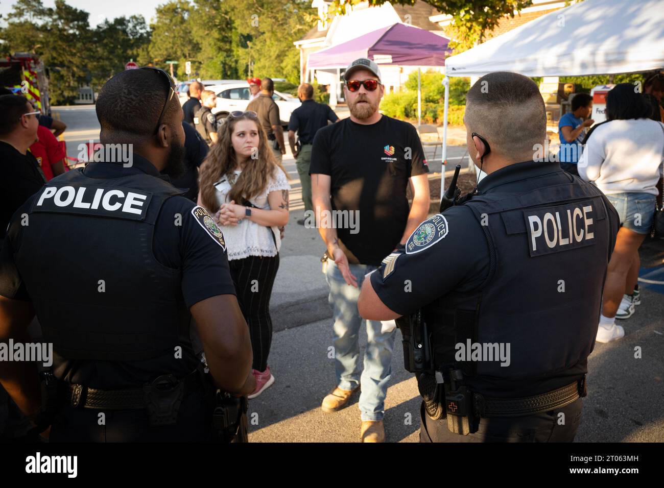 Powder Springs, USA. 3rd Oct, 2023. Powder Springs Police officers chat with visitors