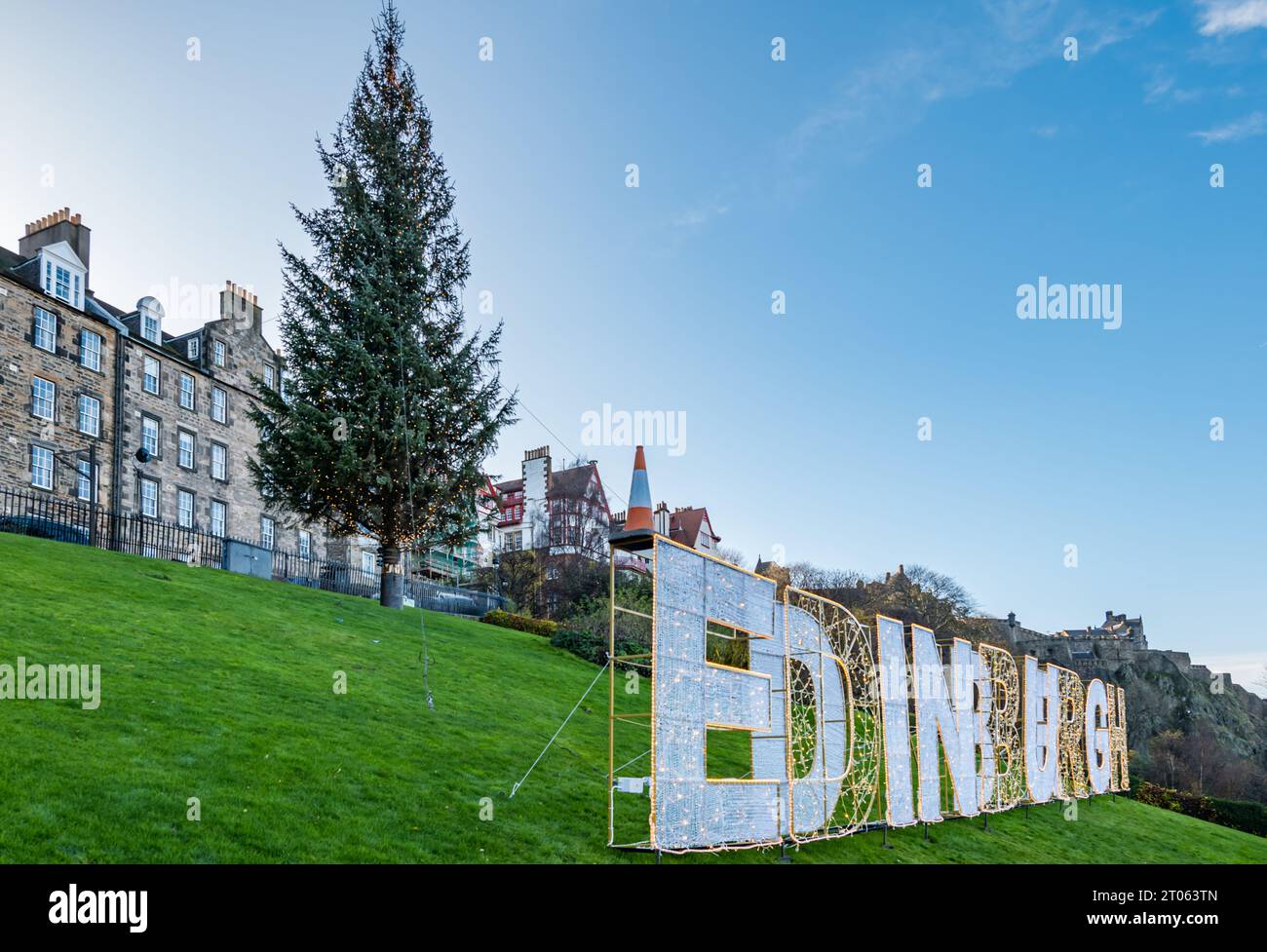 Edinburgh sign on The Mound with Norwegian Christmas tree in Winter, Scotland, UK Stock Photo