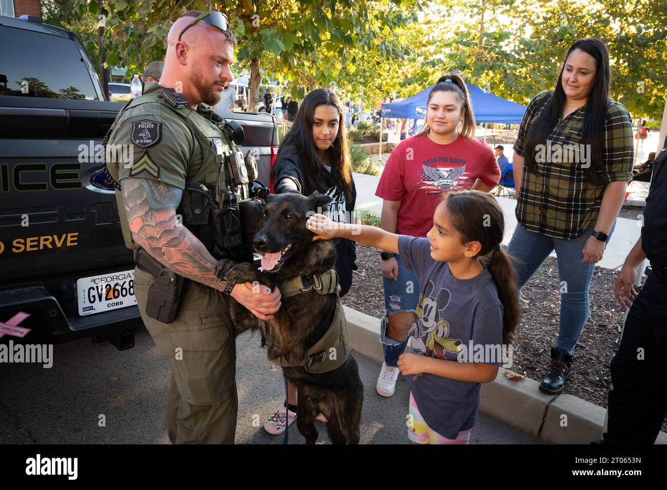 Powder Springs, USA. 3rd Oct, 2023. Austell Police Canine Officer Edward Reeves and his