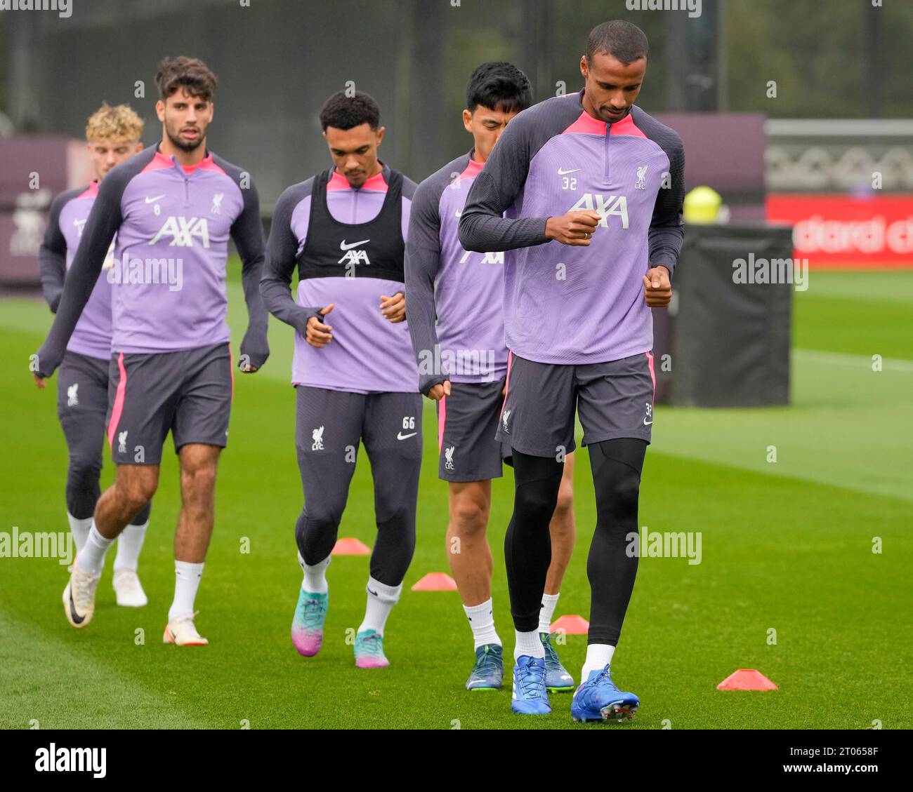 Joel Matip #32 of Liverpool leads a group of Liverpool players as they warm up during the Europa League Training Session at AXA Training Centre, Kirkby, United Kingdom, 4th October 2023  (Photo by Steve Flynn/News Images) Stock Photo