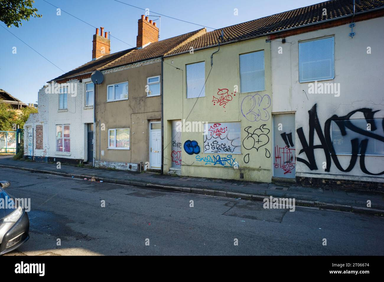 Abandoned and boarded up terraced houses in Cromwell Road, Peterborough Stock Photo