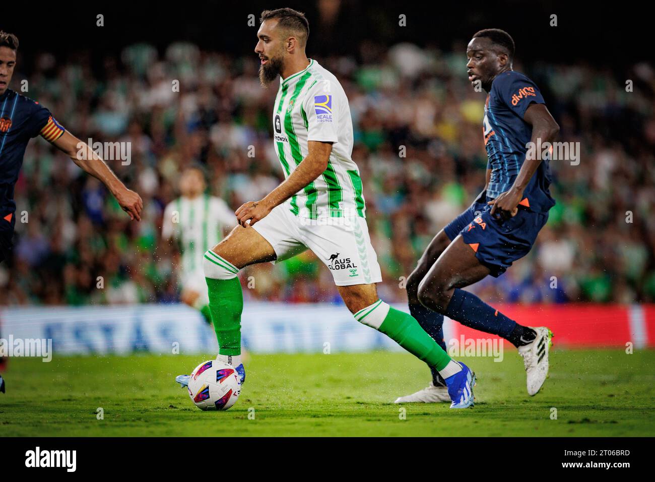 Borja Iglesias of Real Betis, left, and Miha Blazic of Ferencvaros TC vie  for the ball during the Europa League group G soccer match between Ferencvaros  TC and Real Betis in Groupama