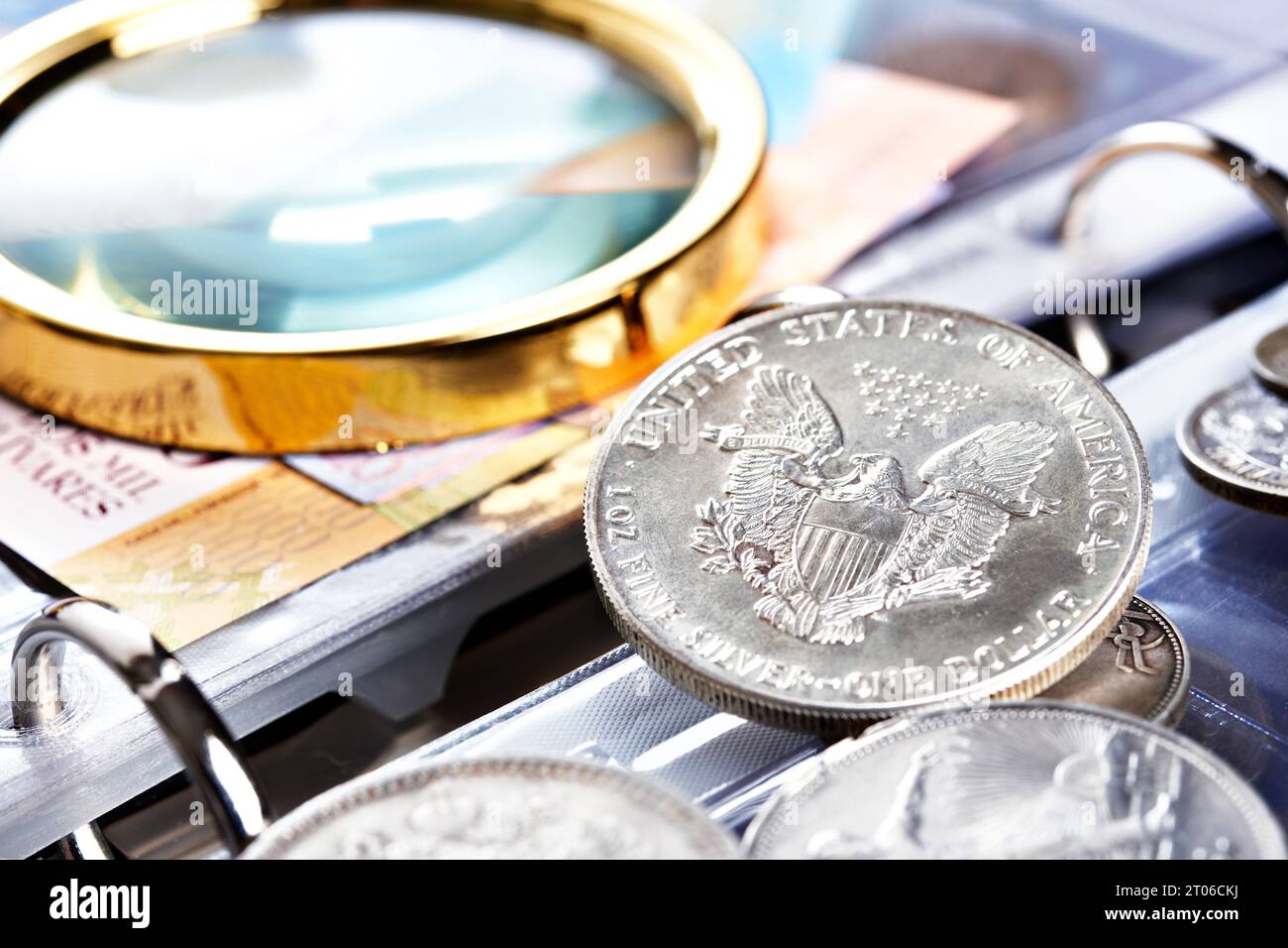 american coins under a magnifying glass, Stock Photo, Picture And