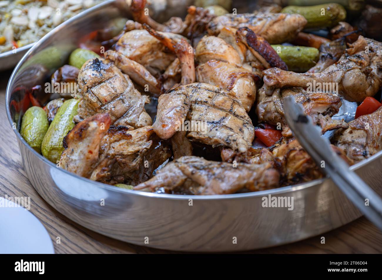 Chicken and rice on dinner table well prepared and served Stock Photo