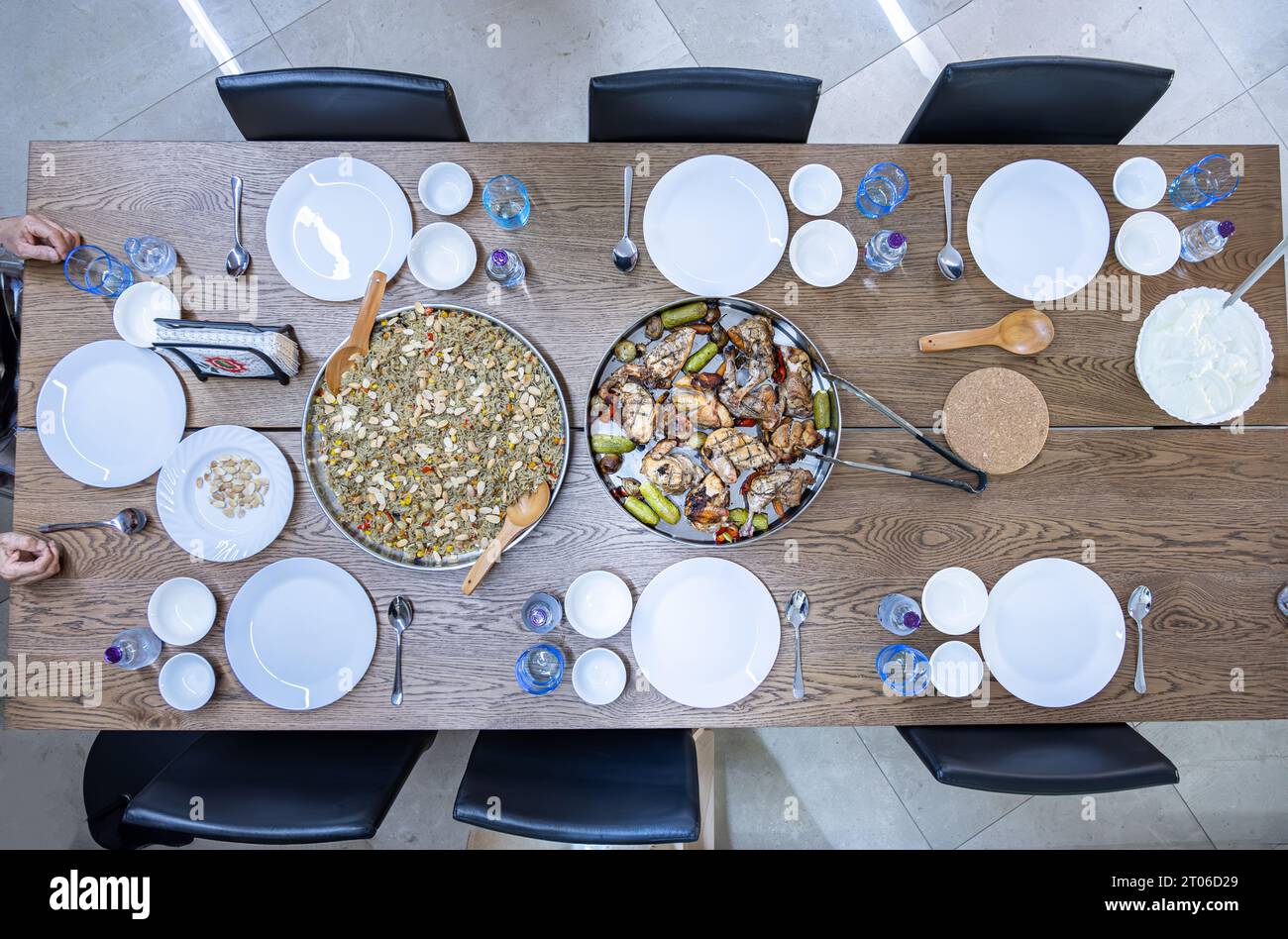 dinner table is prepared and ready for family gathering time and celebration Stock Photo
