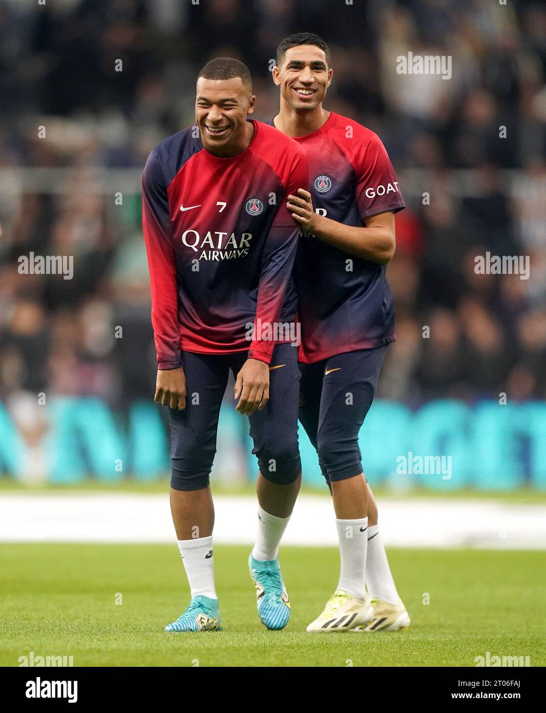 Paris Saint-Germain's Kylian Mbappe and Achraf Hakimi warm up on the pitch before the UEFA Champions League Group F match at St. James' Park, Newcastle upon Tyne. Picture date: Wednesday October 4, 2023. Stock Photo
