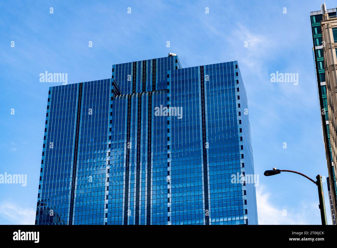 city downtown with skyscraper. office building in business district. skyscraper building architecture. skyscraper with glassy facade and exterior. mod Stock Photo