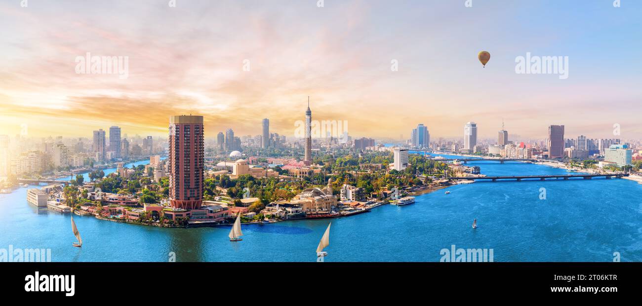 Sunset over the Nile river, view of modern center of Cairo, TV Tower ...