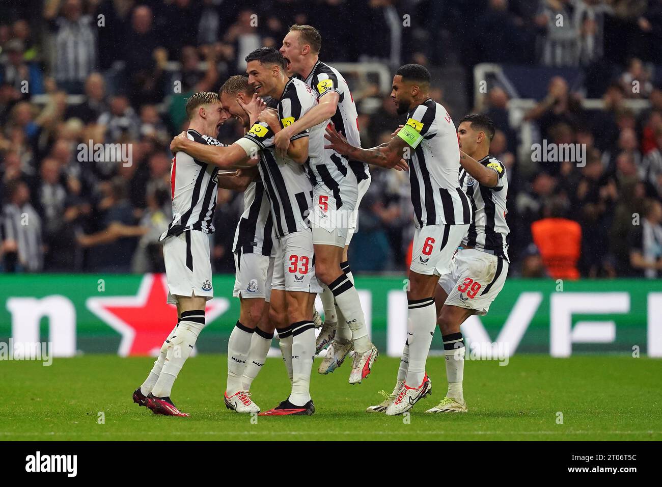 Newcastle United's Dan Burn celebrates scoring their side's second goal of  the game with team-mates during the UEFA Champions League Group F match at  St. James' Park, Newcastle upon Tyne. Picture date: