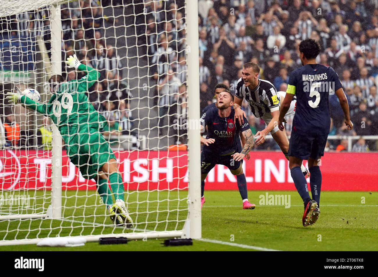 Paris Saint-Germain goalkeeper Gianluigi Donnarumma fails to stop the ball crossing the line as Newcastle United's Dan Burn scores their side's second goal of the game during the UEFA Champions League Group F match at St. James' Park, Newcastle upon Tyne. Picture date: Wednesday October 4, 2023. Stock Photo