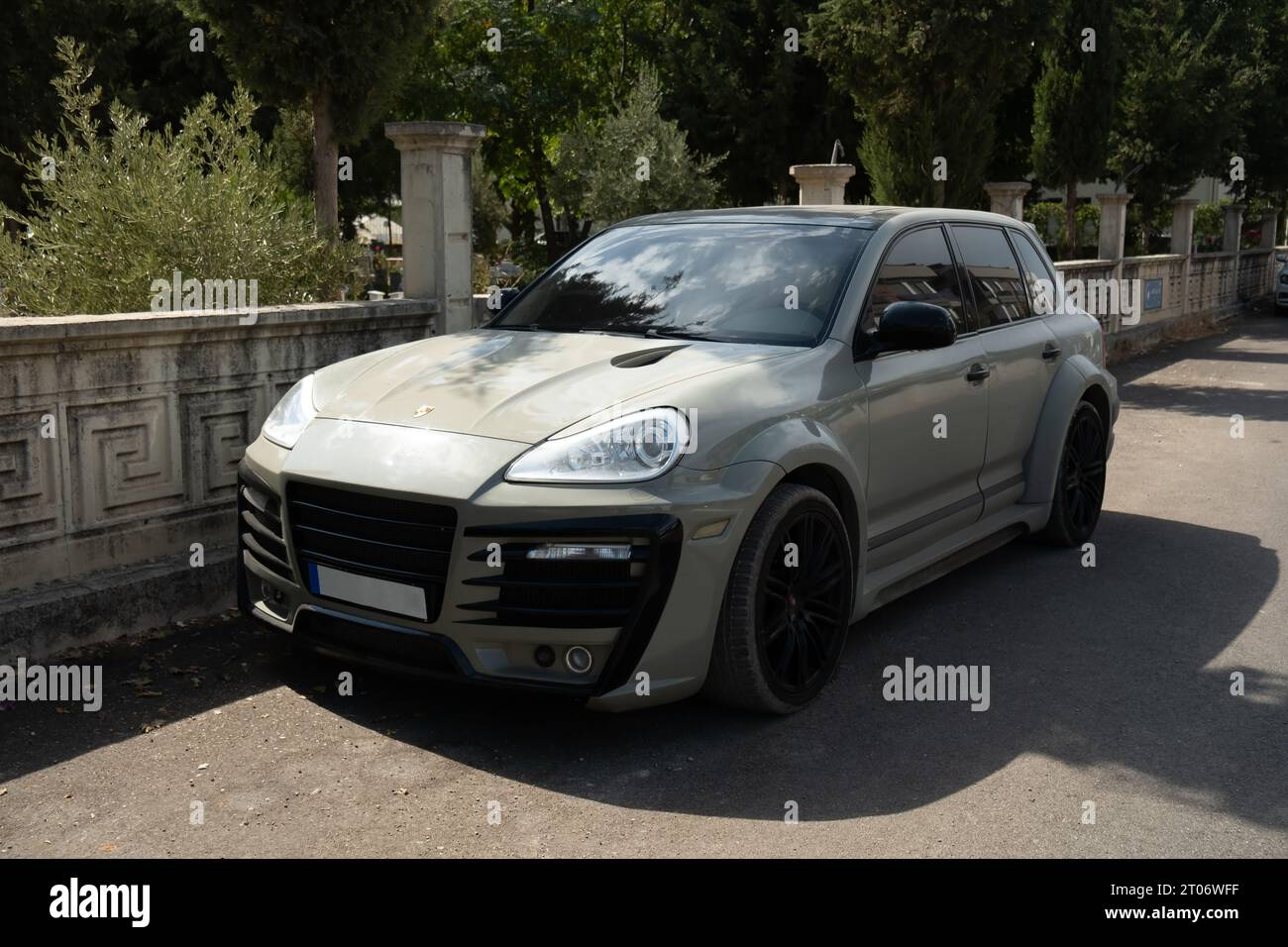 Antalya, Turkey - September 30, 2023: A modified Porsche Cayenne from front view in a street under the sunlight Stock Photo