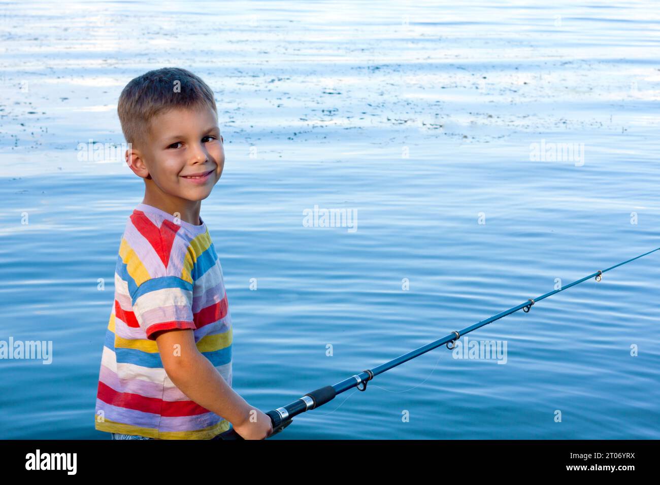 Little boy rod waiting fish hi-res stock photography and images