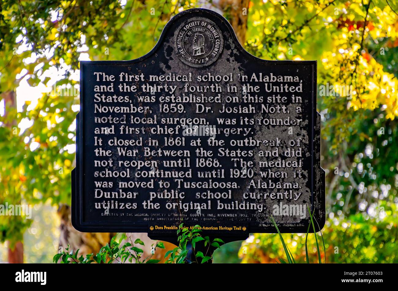 A historic marker stands on the site of the former Medical College of Alabama, Sept. 30, 2023, in Mobile, Alabama. Stock Photo