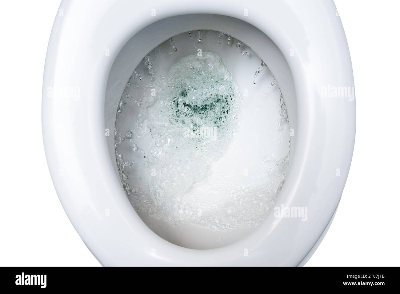 Toilet bowl is flushed with several liters of drinking water, waste of environmental resources in times of global climate warming, high angle view fro Stock Photo