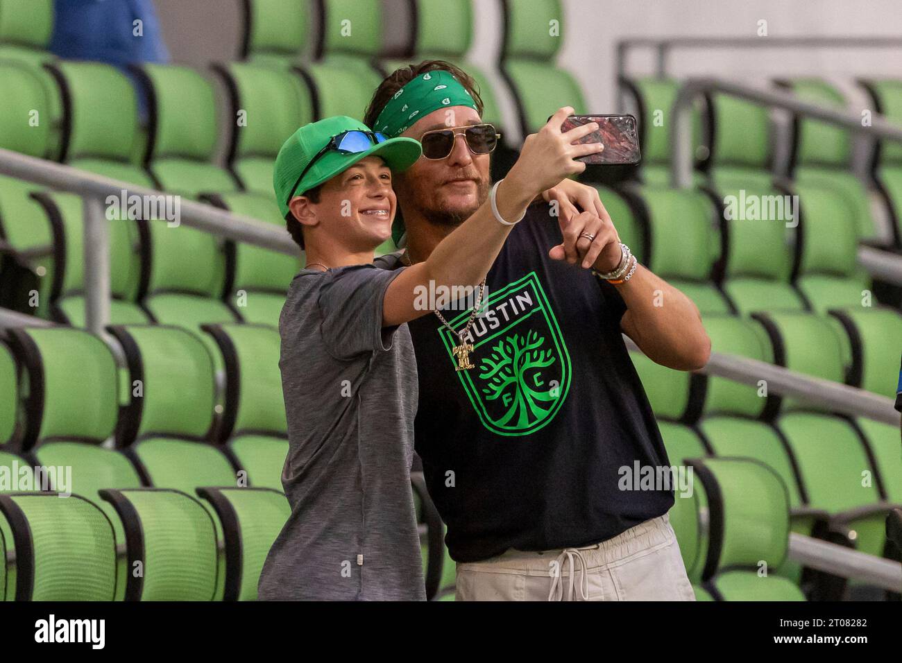 AUSTIN, TX OCTOBER 04 Matthew McConaughey takes a selfie with a fan