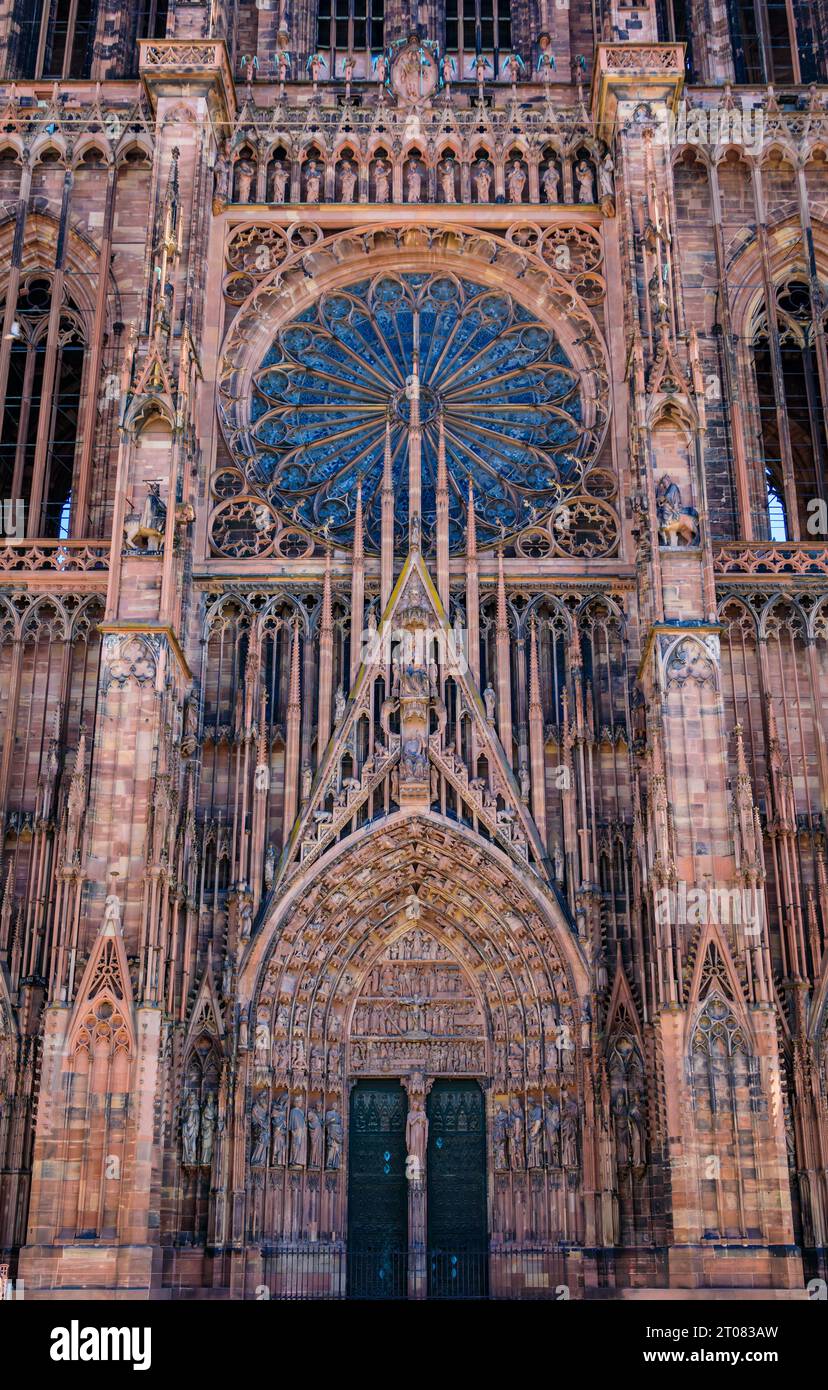 Ornate Gothic facade and side door of the Notre Dame Cathedral in Strasbourg, Alsace, France, one of the most beautiful Gothic cathedrals in Europe Stock Photo