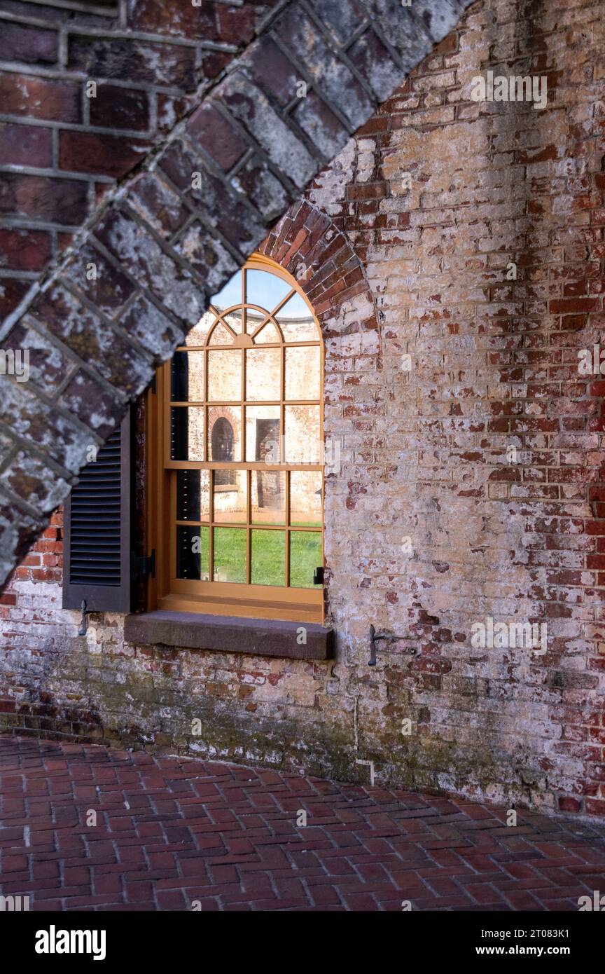 Reflection of fort in window, Fort Macon SP, NC Stock Photo