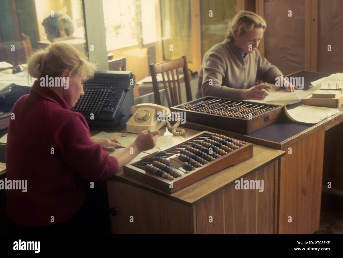 USSR, Russia. Women in office using abacus. Stock Photo
