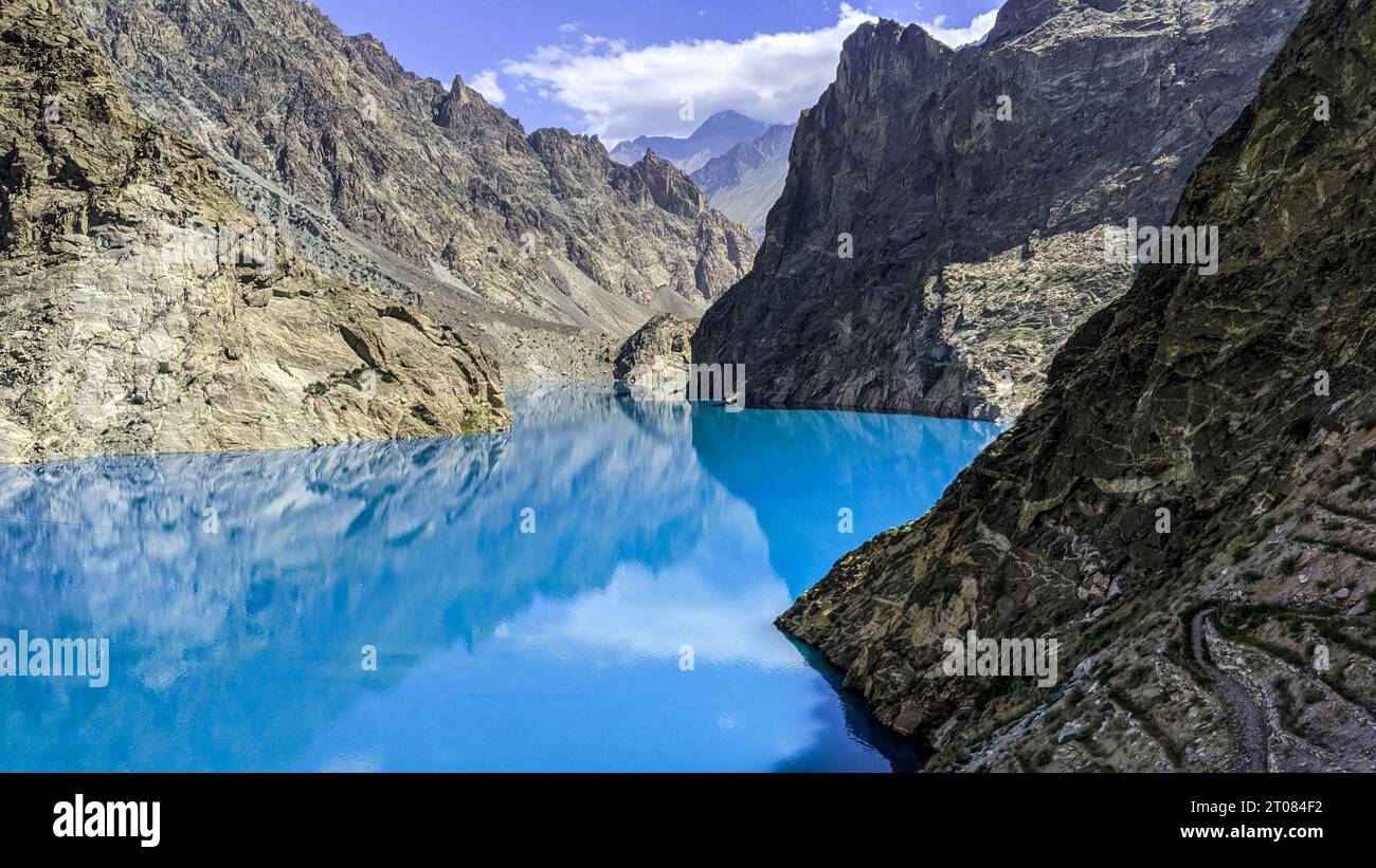 Blue water glacial lake in the Karakoram mountains near the China Pakistan border Stock Photo