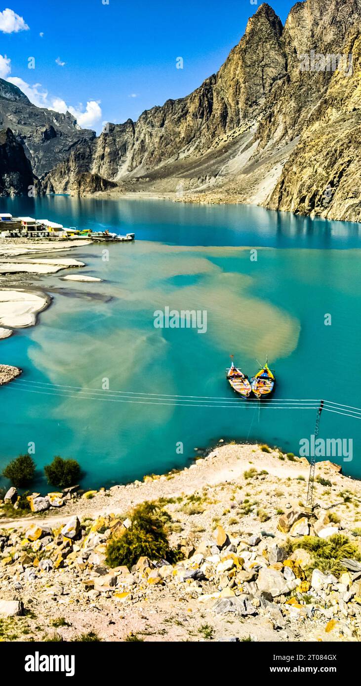 Speed boat in the Attabad lake in the Karakoram range Stock Photo