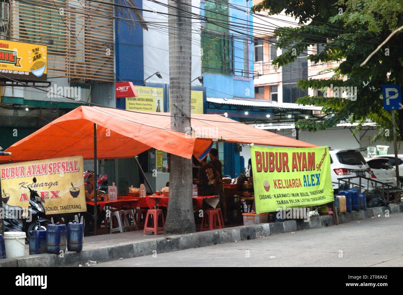 Jakarta, Indonesia - October 10 03: Chicken porridge stall open from afternoon until midnight on Jalan Taman Palem Lestari. A place to eat for familie Stock Photo