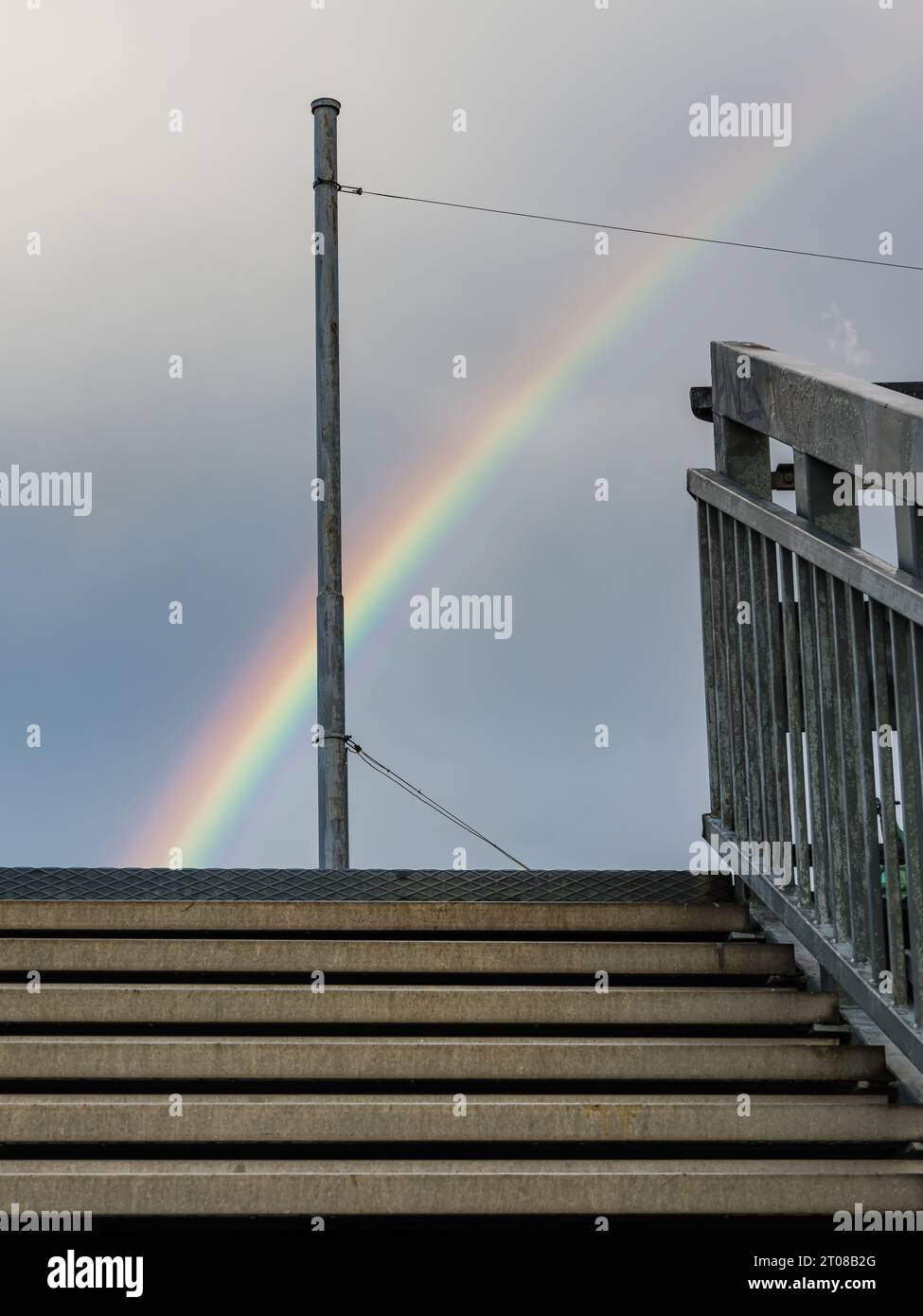 Vibrant rainbow sky above stairs in Gothenburg, Sweden. Stock Photo
