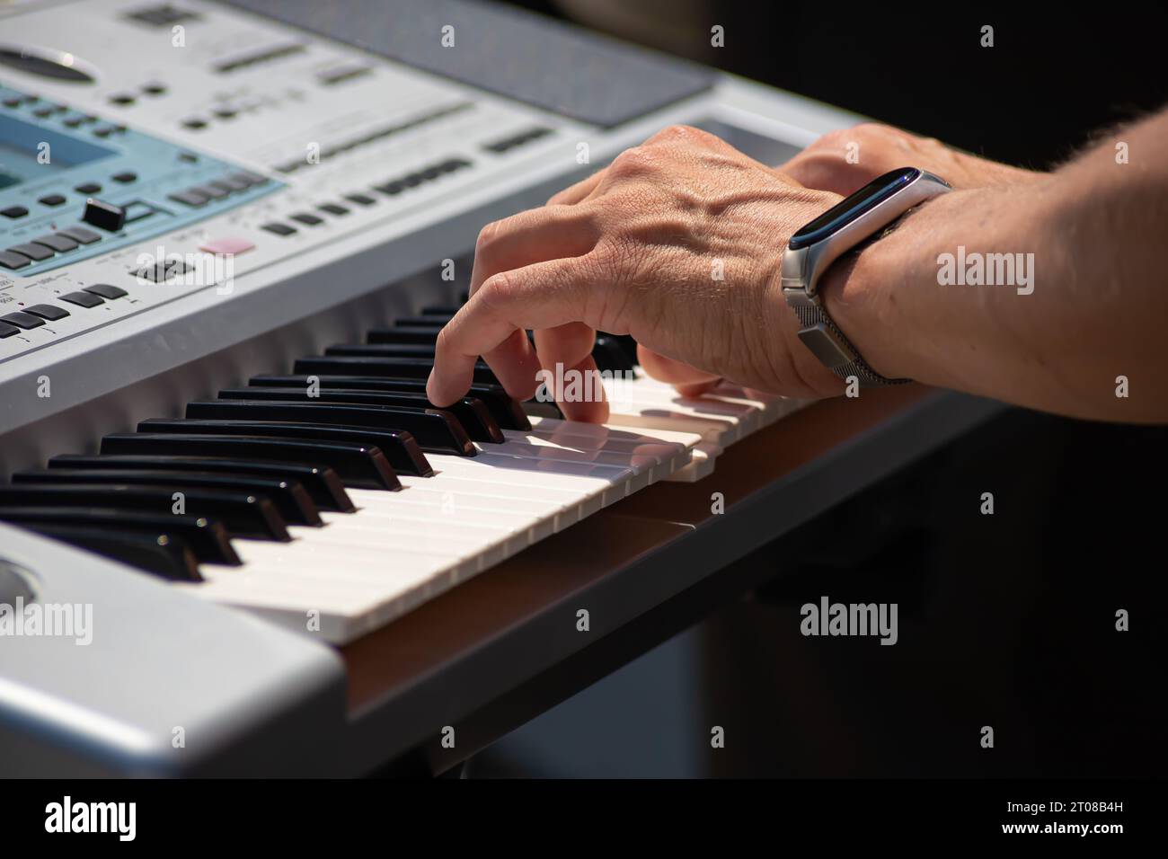 Pianist Play The Keys Of The Electronic Piano Stock Photo Alamy