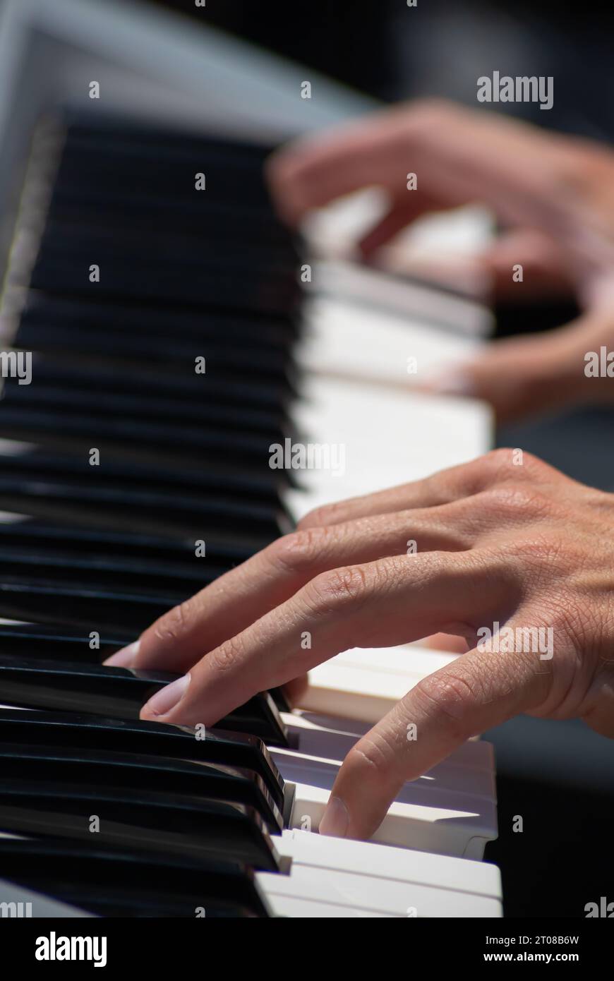 Pianist Play The Keys Of The Electronic Piano Stock Photo Alamy