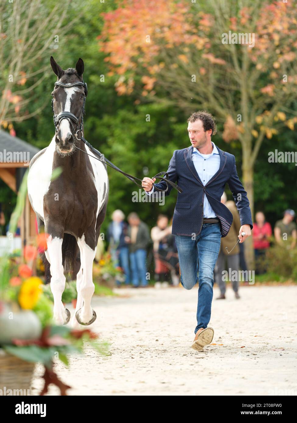 Stephan HAZELEGER of Netherlands with James Bond during the first horse