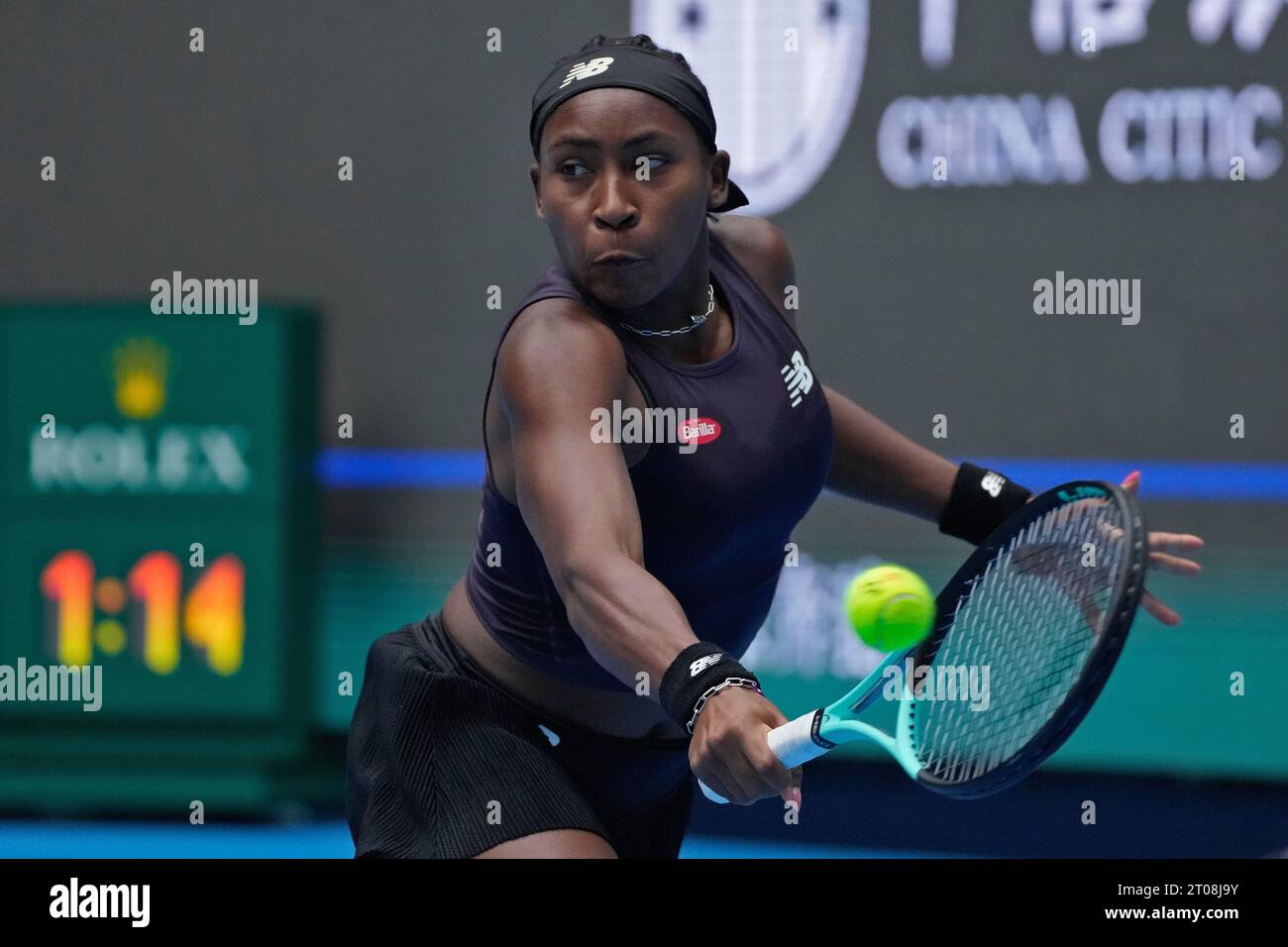 Coco Gauff of the United States returns a shot to Veronika Kudermetova