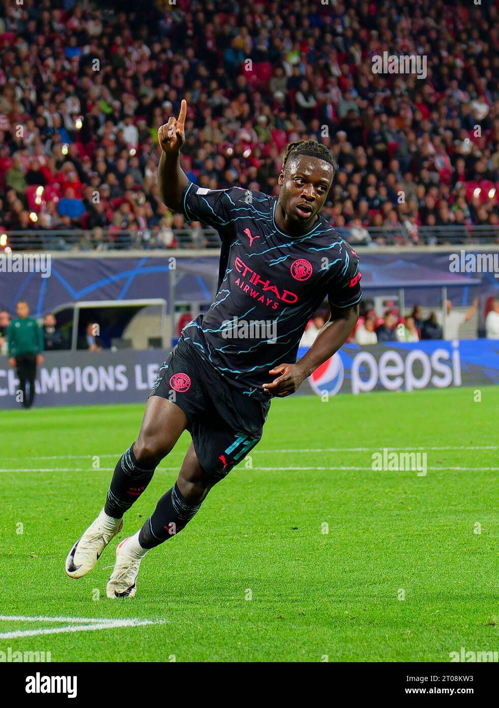 Jeremy Doku, MC 11 celebrates his goal, happy, laugh, celebration, 1-3 in the group G stage match  RB LEIPZIG - MANCHESTER CITY 1-3 of football UEFA Champions League in season 2023/2024 in Leipzig, Oct 4, 2023.  Gruppenphase, , RBL, Red Bull © Peter Schatz / Alamy Live News Stock Photo
