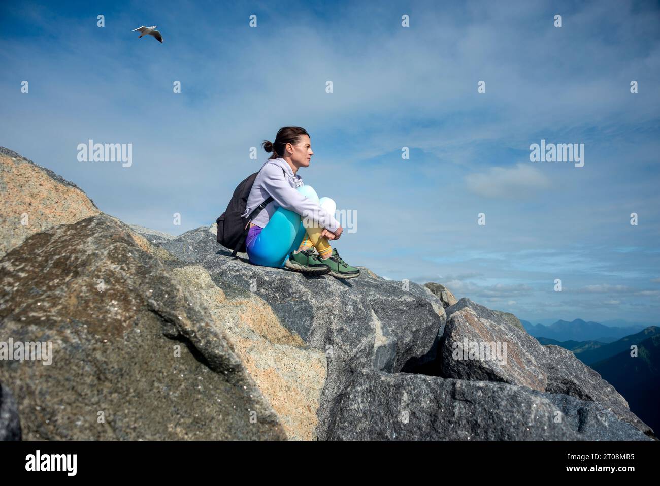 Woman looking over mountain hi-res stock photography and images - Alamy