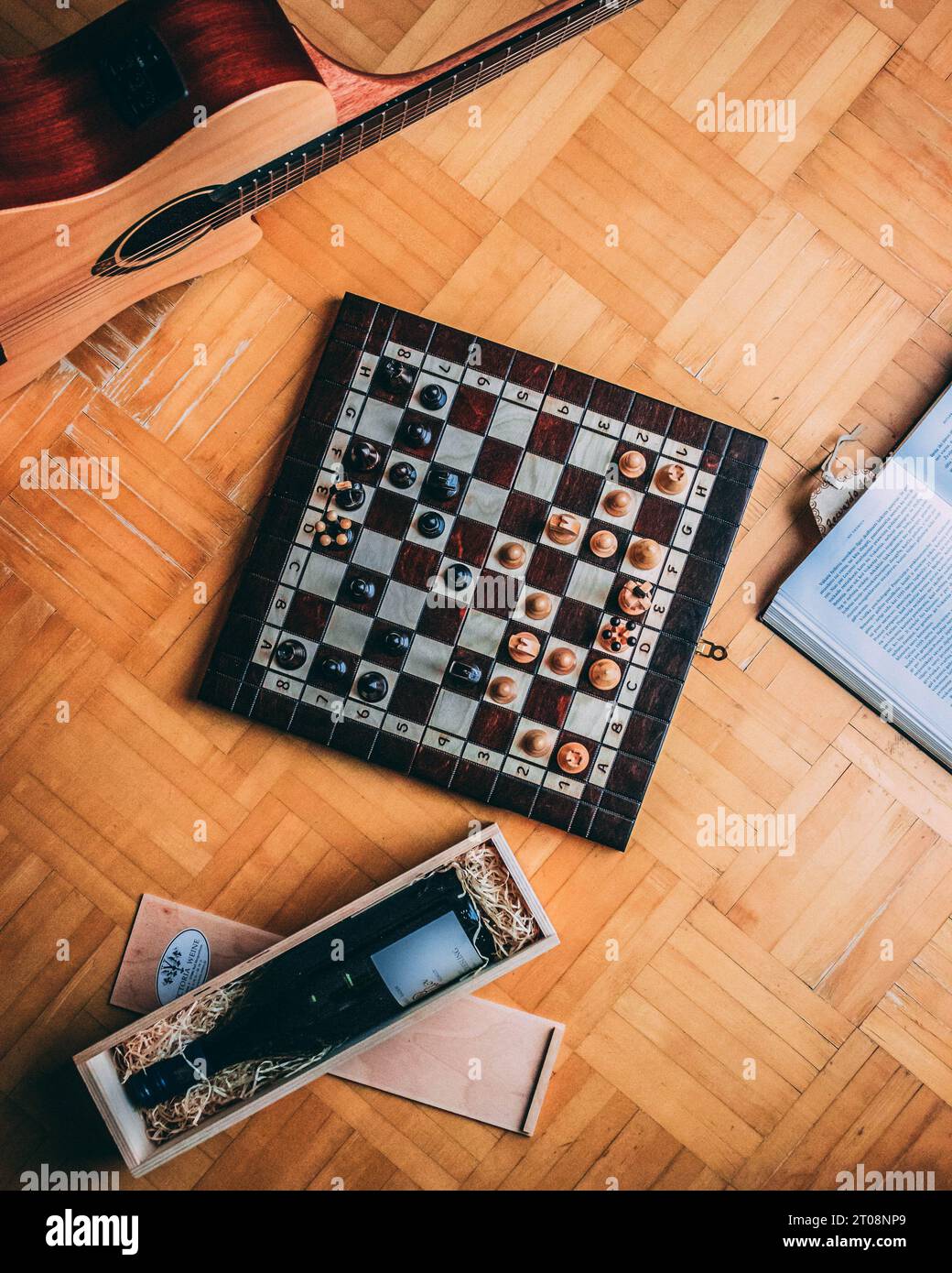 top view of a chess board surrounded by props Stock Photo