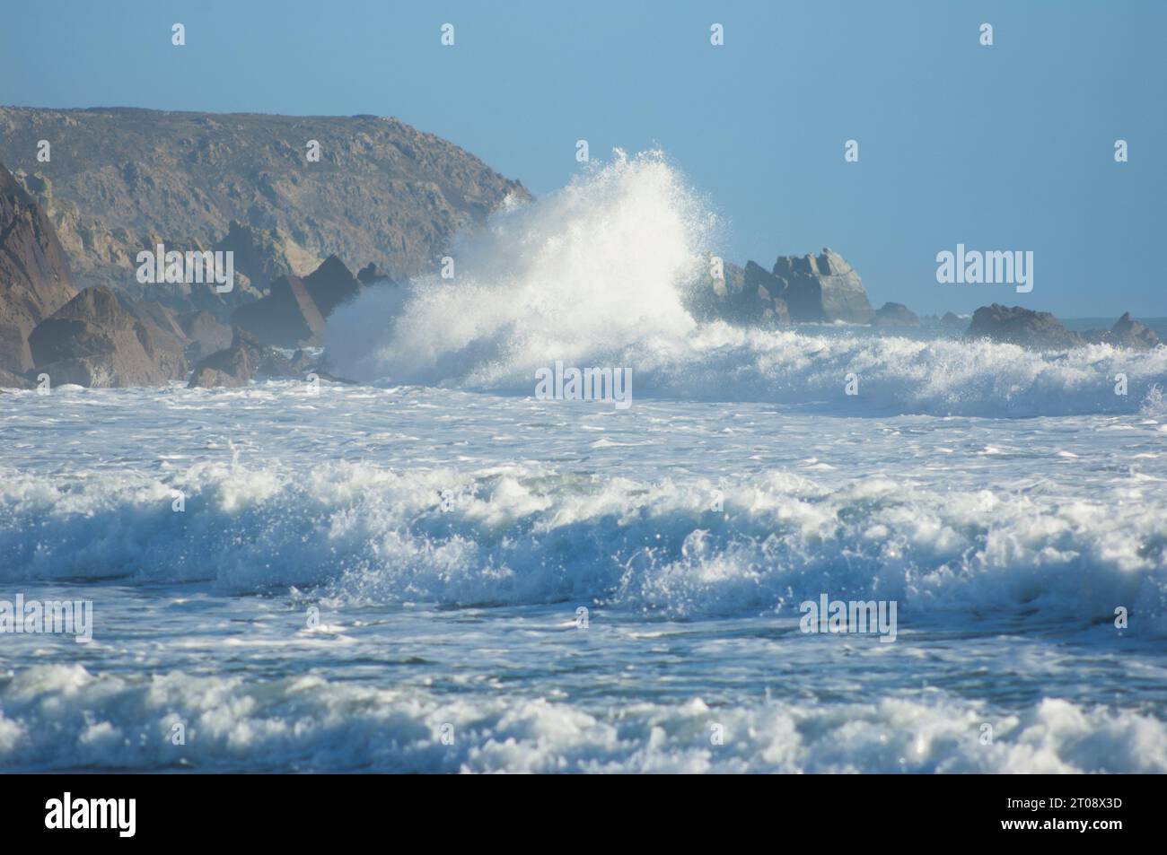 Big sea running at Kennack sands, Cornwall, UK - John Gollop Stock Photo