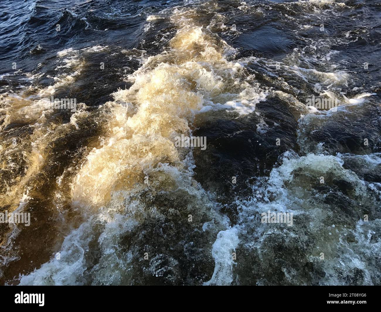Water waves on the surface of the river, closeup of photo Stock Photo ...