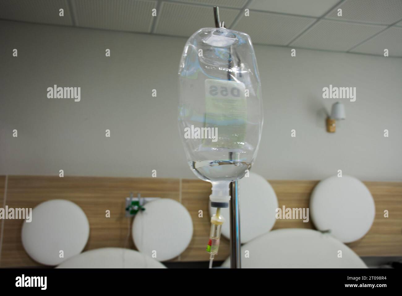 Doctor and nurse use giving saline solution medicine intravenous