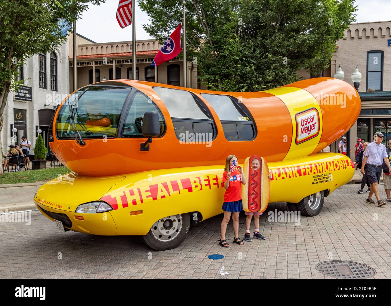 two young kids standing for a picture in front of the Frankmobile in frankling tennessee Stock Photo