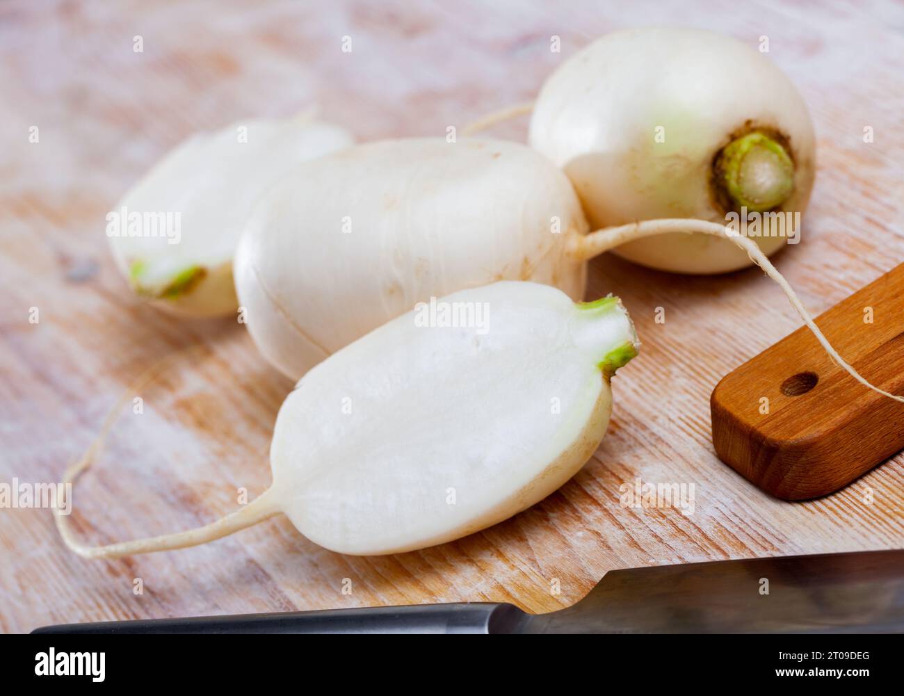 Whole and cut in half turnips Stock Photo Alamy