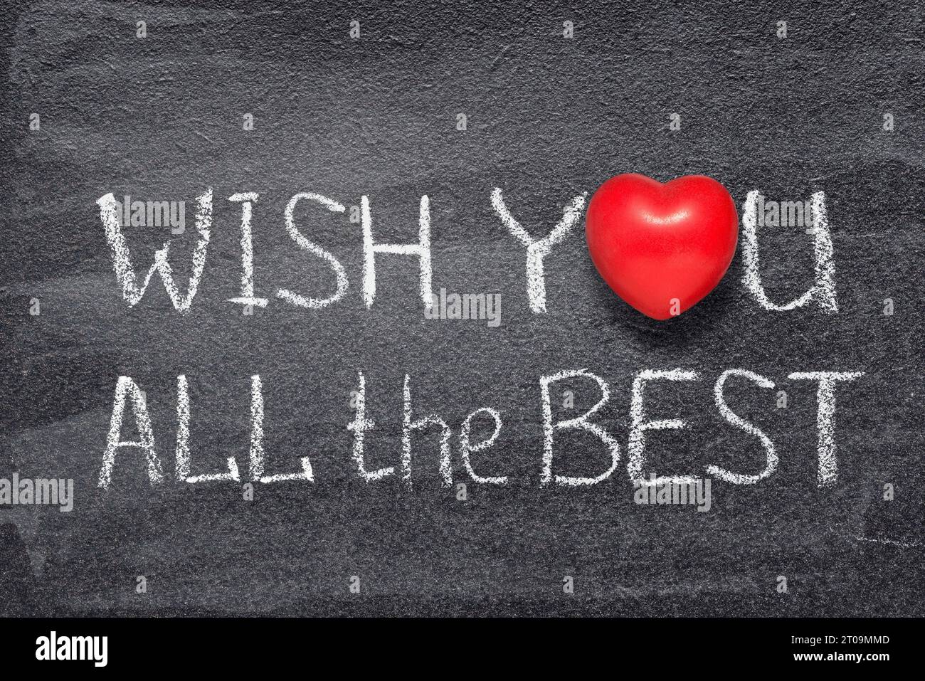 wish you all the best phrase written on chalkboard with red heart symbol Stock Photo